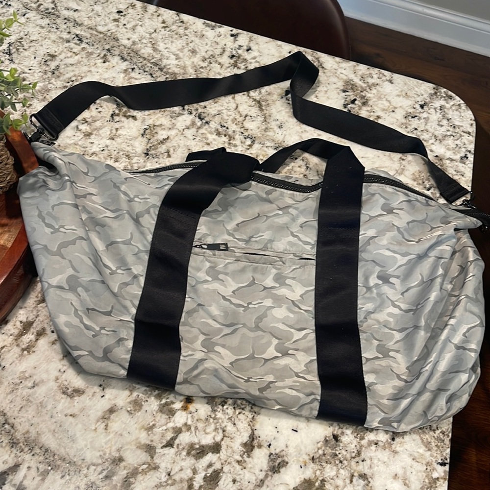 Fabletics gym bag. Normal wear and tear, no flaws/rips in fabric.